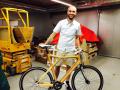 E. Bassi dizaino projektas – medinio rėmo dviratis „Rootless“