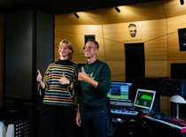 two people showing thumbs up